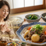 A Japanese Nikujaga (beef and potato stew) set meal on an Arita ware plate, with an image of a calm Japanese woman feeling psychologically safe and well-being, suitable for a blog post about mental resilience and healthy Japanese food.