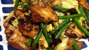 Authentic Sichuan Twice-Cooked Pork Hui Guo Rou with thick pork belly garlic scapes and cabbage